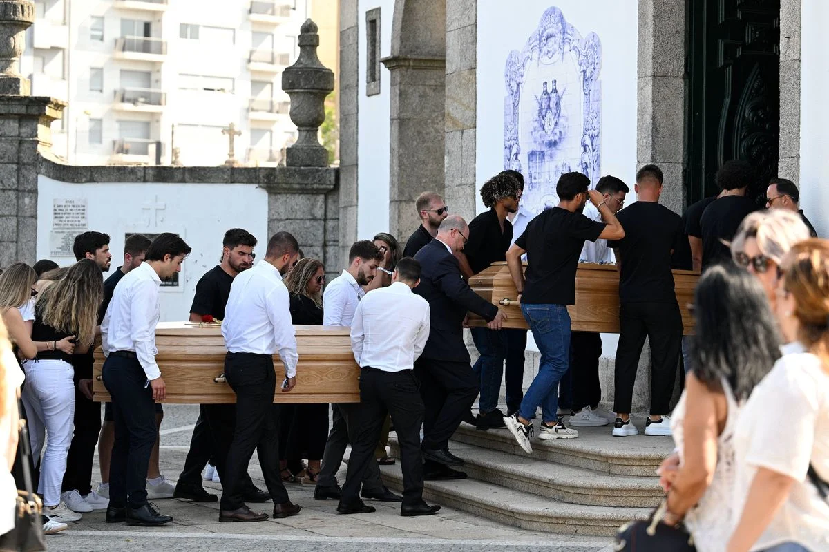 The Coffins of Diogo Jota And Andre Silva are carried by family, former teammates and friends into the Church at a funeral held for Diogo Jota and his brother Andre Silva at Igreja Matriz de Gondomar